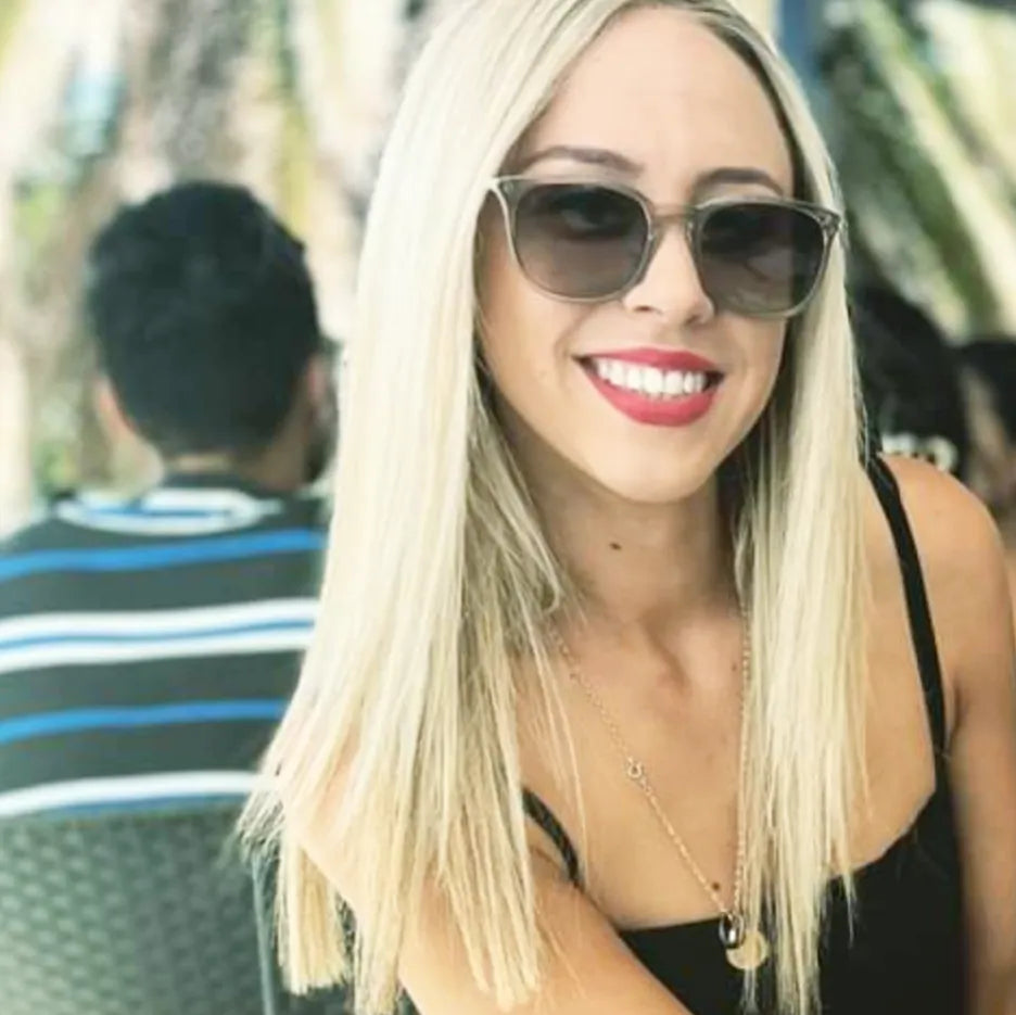 Long platinum blonde hair on a smiling client by NED.K HAIR, mobile hairdresser Central Coast NSW