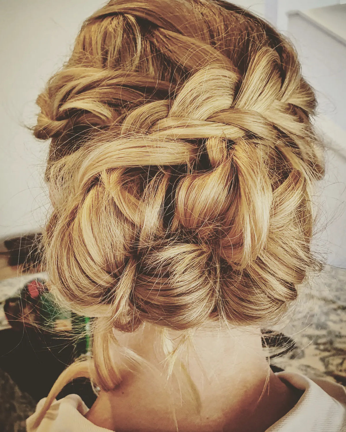 Golden blonde braided upstyle close-up – Central Coast mobile hairdresser
