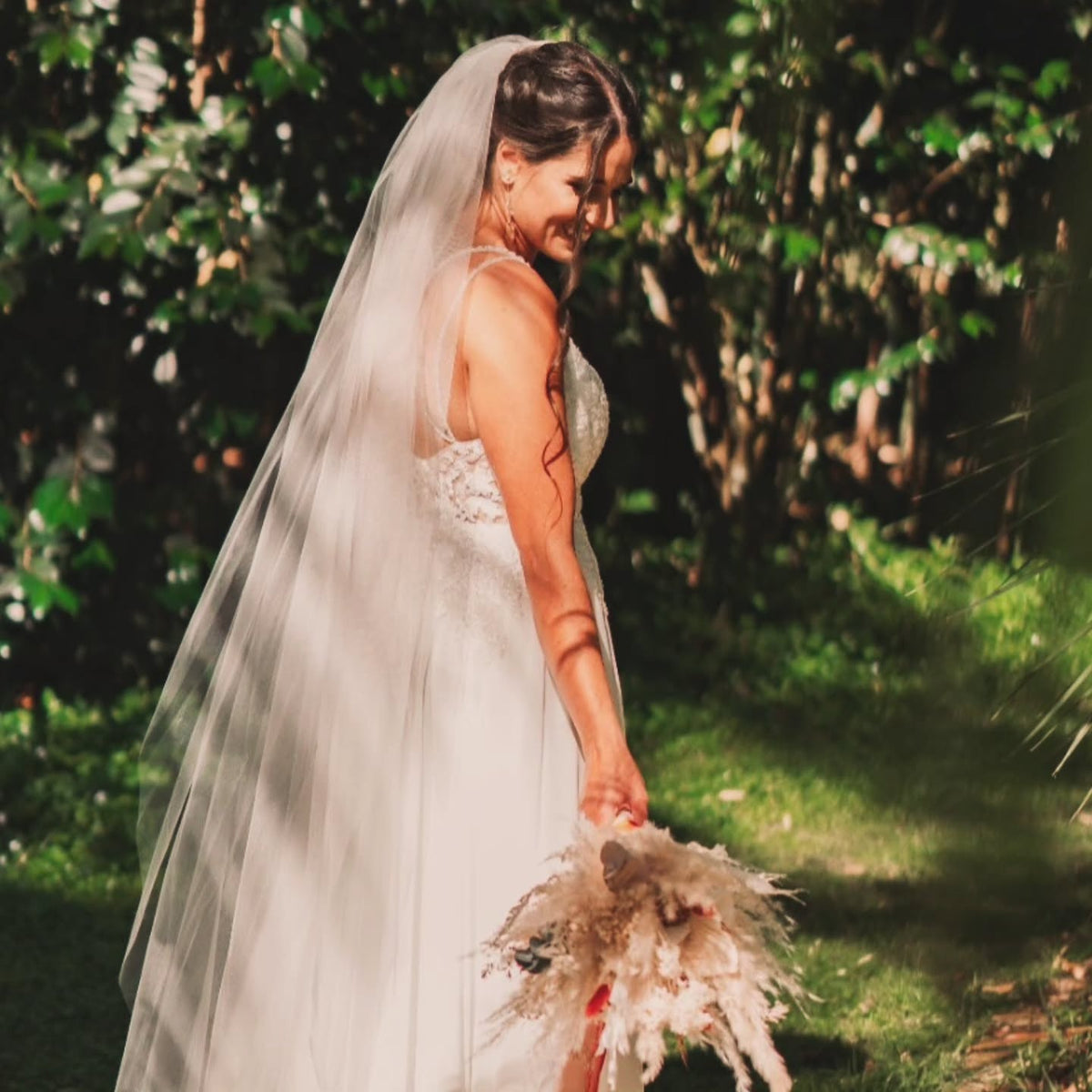 Bride with a long veil and soft curls by NED.K HAIR, mobile hairdresser Central Coast NSW