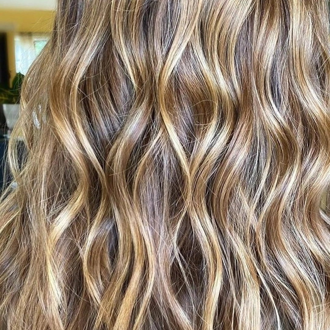 Honey blonde highlights through brunette waves – Central Coast mobile hairdresser